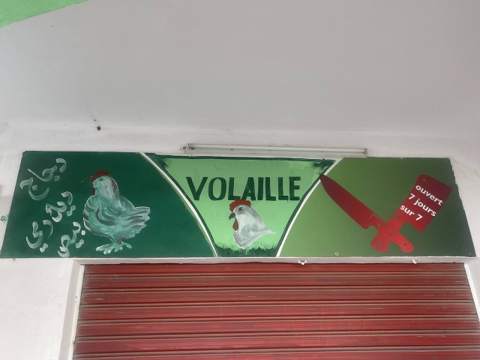 Hand-painted Tunisian street sign