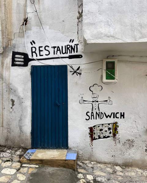 Hand-painted Tunisian street sign