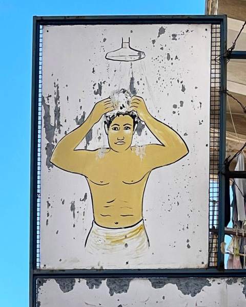Hand-painted Tunisian street sign