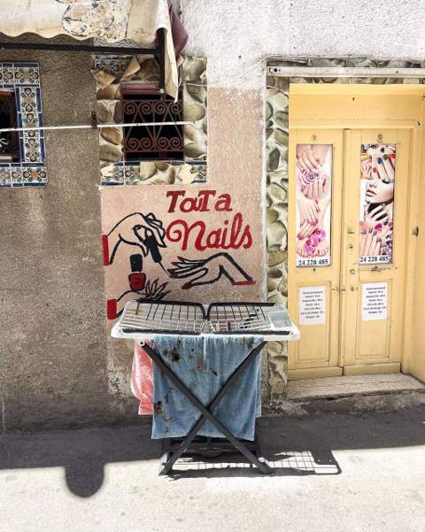 Hand-painted Tunisian street sign